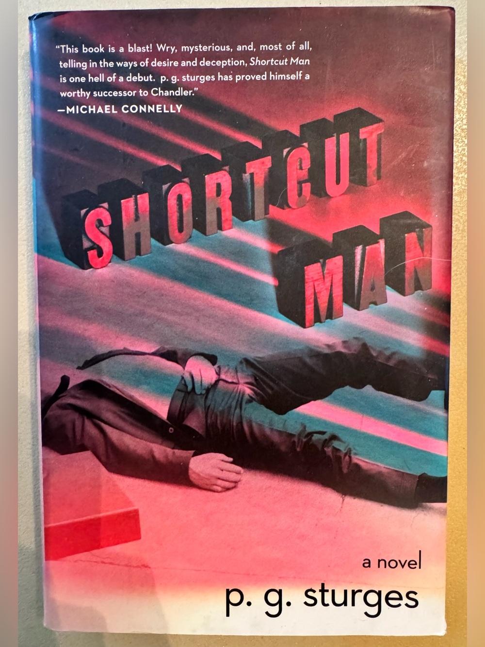 Shortcut Man by P. G. Sturges - Vivid Pink & Teal Cover